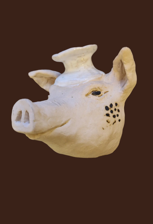 Kokkegrisen i keramikk